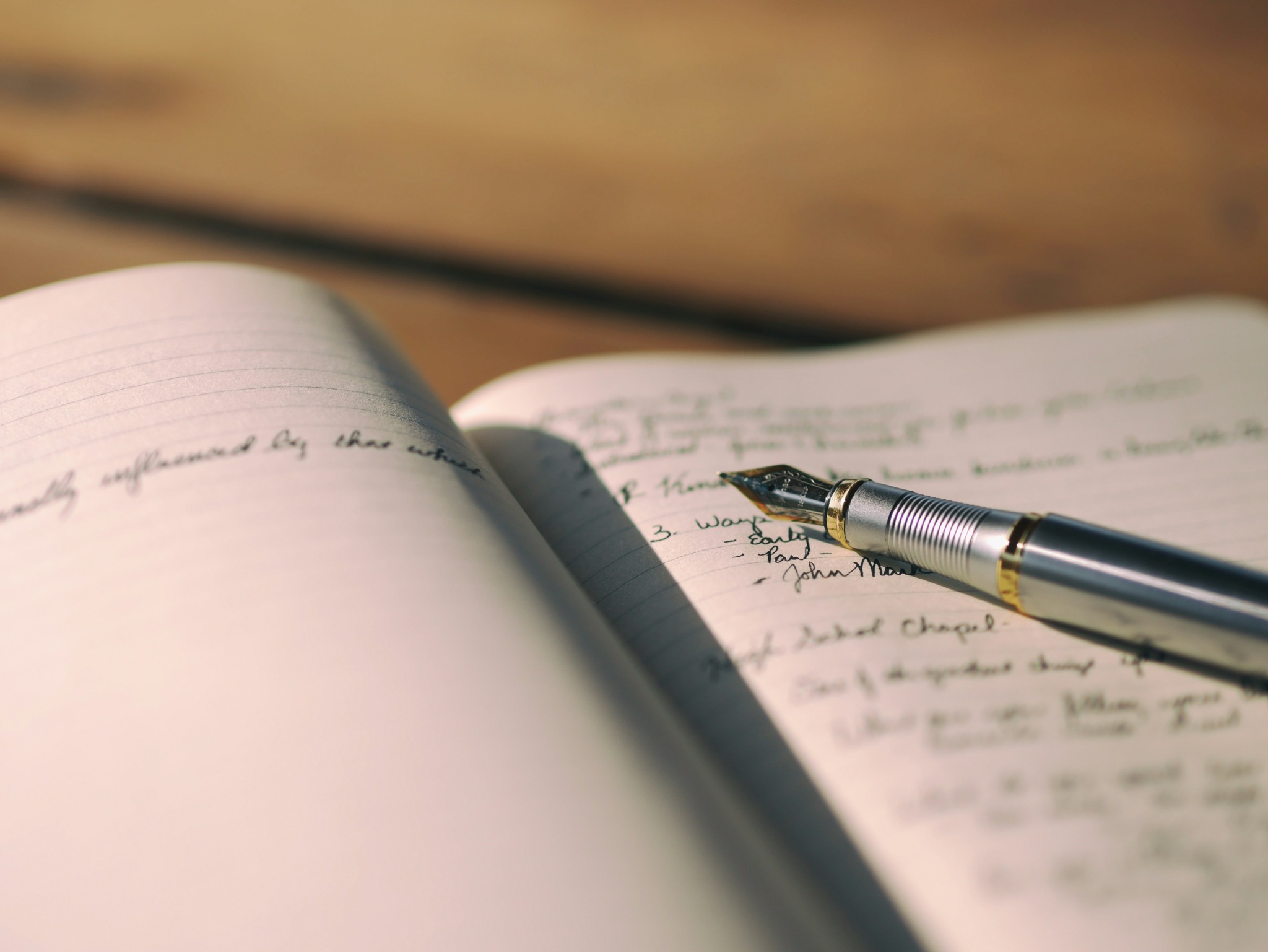 Person typing on a notebook